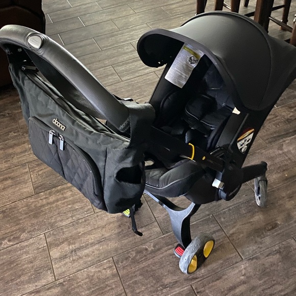 Midnight black doona stroller. - Picture 4 of 7